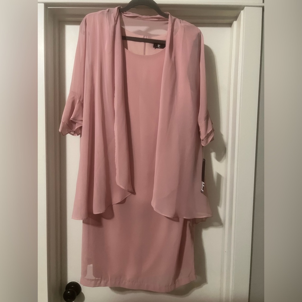 Women’s size 14 dress. Never used. New